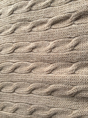 Knitted fabric woolen texture background, closeup surface image