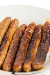 BBQ grilled domestic sausages on the plate