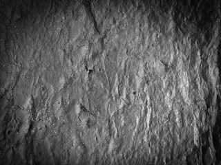 Naklejka premium Black stone natural texture background surface, close up image