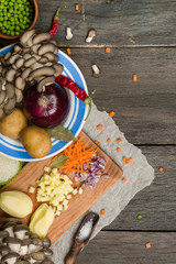 ingredients for vegetable soup. vegetables cucumber onions potatoes carrots mushrooms