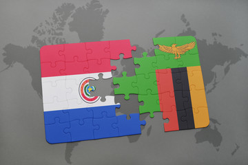 puzzle with the national flag of paraguay and zambia on a world map