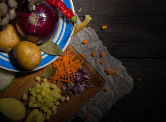 ingredients for vegetable soup. vegetables cucumber onions potatoes carrots mushrooms