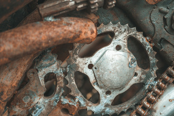 Close up rusted steel parts in junkyard