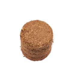 Compressed compost tablet isolated