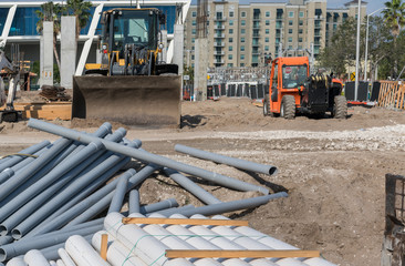 Messy construction site with pvc pipe