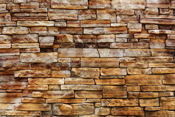 background and texture of granite stone wall surface.