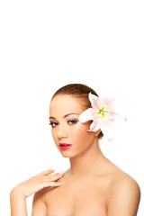 Fototapeta premium Beautiful spa woman with lily.