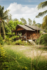Fototapeta na wymiar View of nice bamboo hut in summer environment