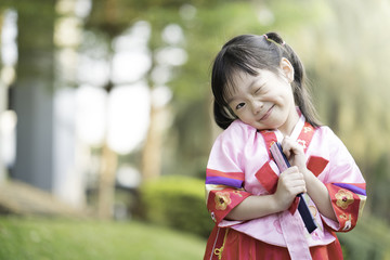 Korean child wearing a Traditional Hanbok - Powered by Adobe