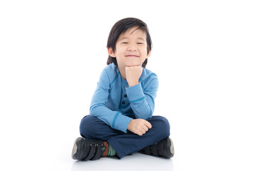 asian boy sitting on white background