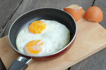 fried twin eggs with pan