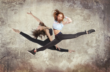 Fototapeta na wymiar Young woman modern ballet dancing