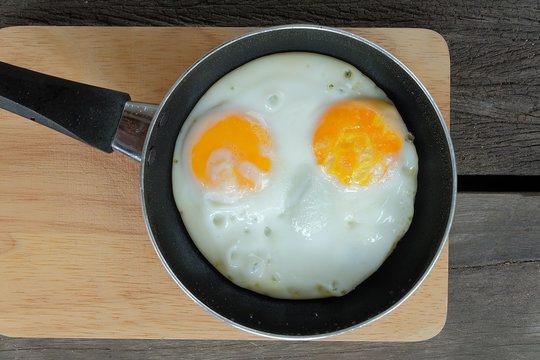 fried twin eggs with pan