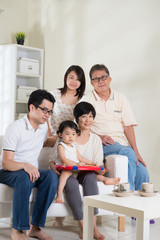 multi generation asian family at home