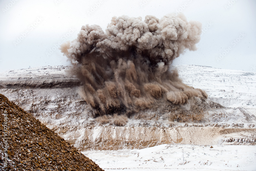 Wall mural explosive works on open pit