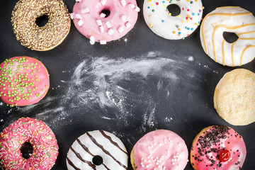 glazed donuts with different fillings on a black background