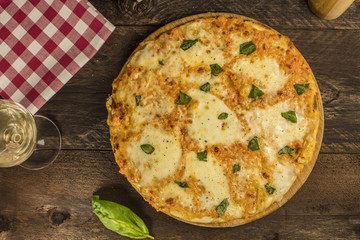 Homemade Margherita pizza with basil leaf and copyspace