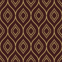 Elegant classic pattern. Seamless abstract background with repeating elements. Brown and golden pattern