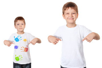 Little boy pointing his fingers on a white t-shirt