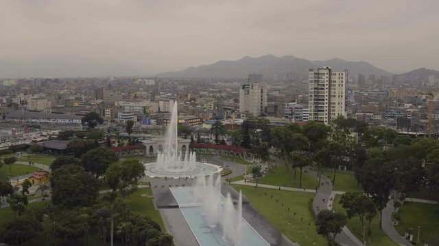 Lima Peru Aerial v17 Flying low over Reserve Park and fountains.