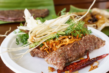 rice mixed with pork blood serve with vegetable, local food of north at thailand