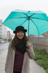 Asian Woman Holding Umbrella While Raining