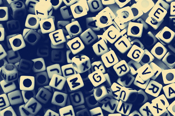 black and white of English alphabet cube as background