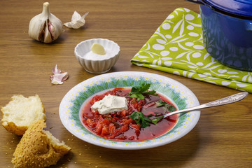 Vegetable soup with red beet, carrots and tomatoes