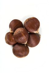 Raw organic chestnuts isolated on a white background