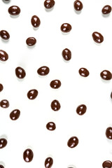 Milk chocolate almonds isolated on a white background