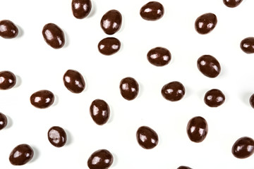 Milk chocolate almonds isolated on a white background