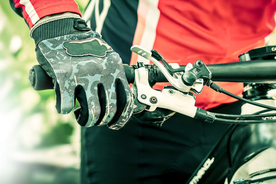 Close up hand with glove of bicycle sport