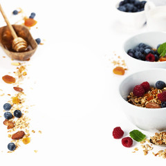 Healthy breakfast -  Homemade granola, honey, milk and berries