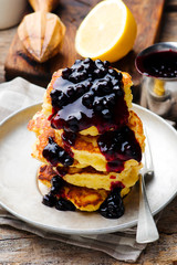 LEMON RICOTTA PANCAKES WITH BLUEBERRY SAUCE.