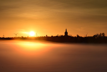 Naklejka premium Winter landscape skyline in sunrise