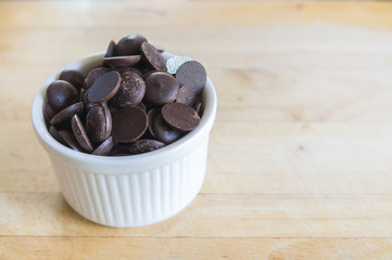 Closeup of chocolate on wooden background