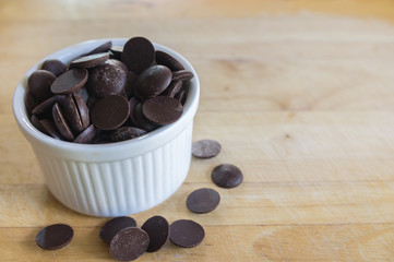 Closeup of chocolate on wooden background