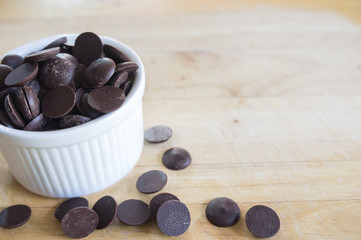 Closeup of chocolate on wooden background