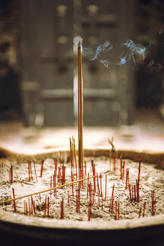 Moldering stick in temple