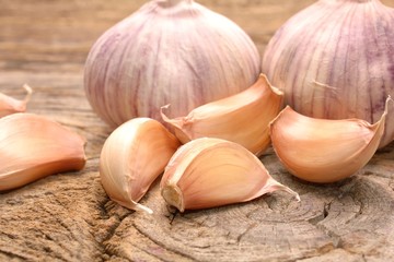 Garlic on the wooden background