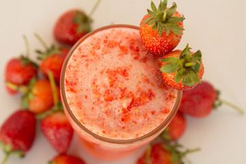 Juice strawberry smoothie. On a white background