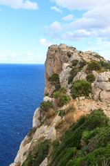 Fototapeta na wymiar Lookout point Mirador Es Colomer at Cap de Formentor cliff coast and Mediterranean Sea, Majorca, Spain
