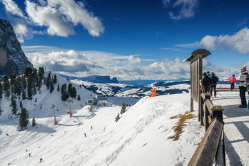Sunny view of snow valley near Canazei of Val di Fassa, Trentino-Alto-Adige region, Italy.