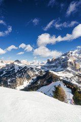 Sunny view of snow valley near Canazei of Val di Fassa, Trentino-Alto-Adige region, Italy.