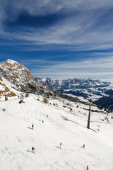 Sunny view of Dolomite Alps near Canazei of Val di Fassa, Trentino-Alto-Adige region, Italy.