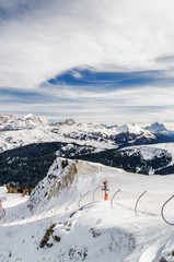 Cloudy view of Dolomite Alps near Alta Badia of Val di Fassa, Trentino-Alto-Adige region, Italy.