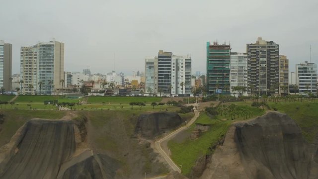 Lima Peru Aerial v29 Flying low over cliff side and into Miraflores panning.