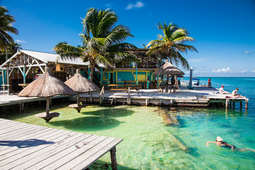 Beautiful  caribbean sight with turquoise water in Caye Caulker,  Belize - 137756274
