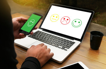 business man select happy on satisfaction evaluation? And good mood smiley