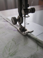 Hemmed edge of the fabric using a sewing machine
